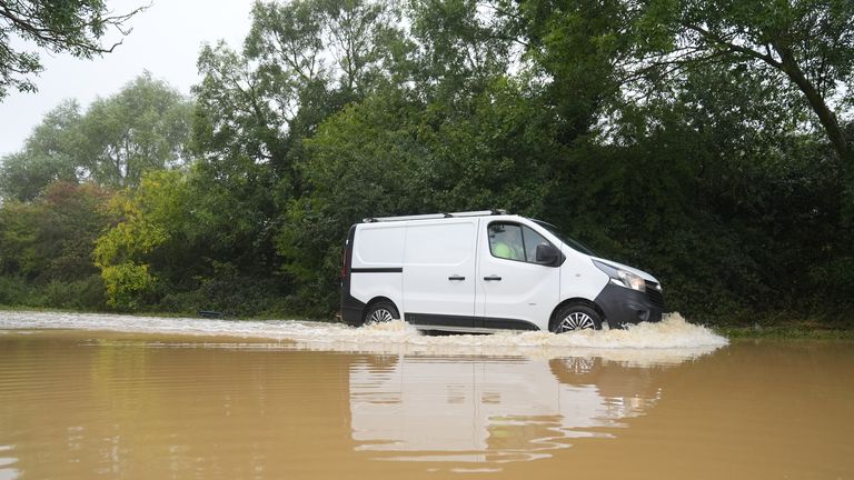 A van in flood water on Hardwater Road near Wellingborough. Pic: PA