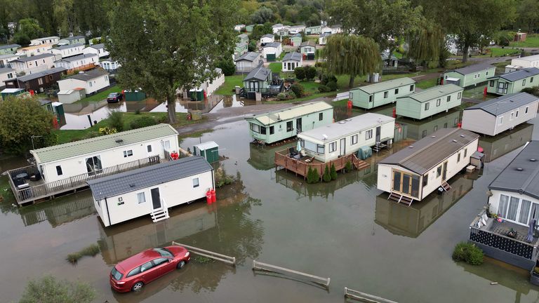 A car is found flooded at Billing Aquadrome holiday park in Northamptonshire, where 43 people have been evacuated. Photo: PA