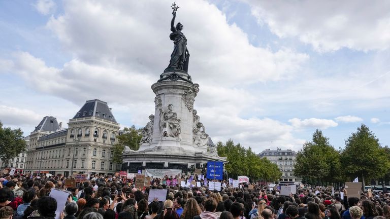 People take part in a gathering at Place de la Rebublique in support of 71-year-old Gisele Pelicot who was allegedly drugged by her ex-husband and raped by dozens of men while unconscious, Saturday, Sept. 14, 2024 in Paris.  (AP Photo/Michel Euler)