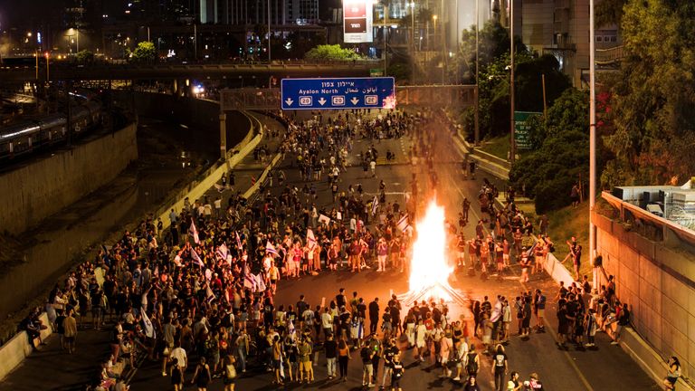 A drone photo of protesters setting a fire on the main access road to Tel Aviv to show support for the hostages who were kidnapped during the deadly October 7 attack, amid the ongoing conflict in Gaza between Israel and Hamas, in Tel Aviv, Israel September 1, 2024. REUTERS/Oren Alon