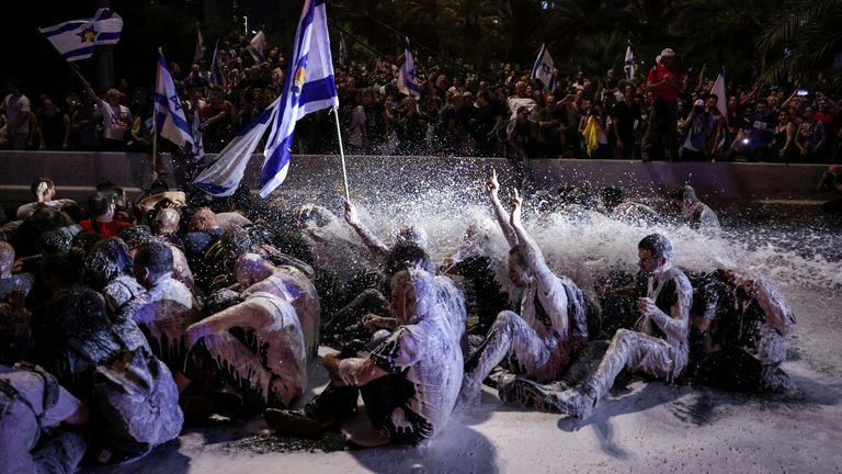 Police use water canon during a rally to show support for the hostages who were kidnapped during the deadly October 7 attack, amid the ongoing conflict in Gaza between Israel and Hamas, in Tel Aviv, Israel September 1, 2024. REUTERS/Tomer Appelbaum TPX IMAGES OF THE DAY. ISRAEL OUT. NO COMMERCIAL OR EDITORIAL SALES IN ISRAEL