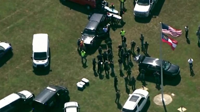 First responders gather after law enforcement officers responded to a fatal shooting at Apalachee High School in a still image from aerial video in Winder, Georgia, U.S. September 4, 2024. ABC Affiliate WSB via REUTERS. NO RESALES. NO ARCHIVES. MANDATORY CREDIT
