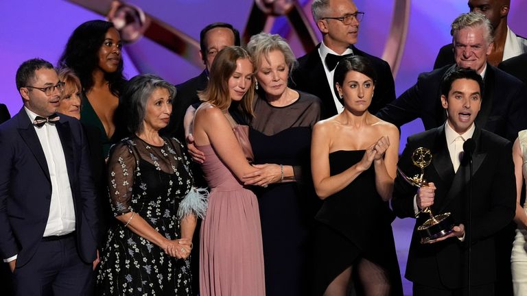 Joe Mande, from left, Rose Abdoo, Hannah Einbinder, Jean Smart, Jen Statsky, Paul W. Downs, and Christopher McDonald, and the team from "Hacks" accept the award for outstanding comedy series during the 76th Primetime Emmy Awards on Sunday, Sept. 15, 2024, at the Peacock Theater in Los Angeles. (AP Photo/Chris Pizzello)