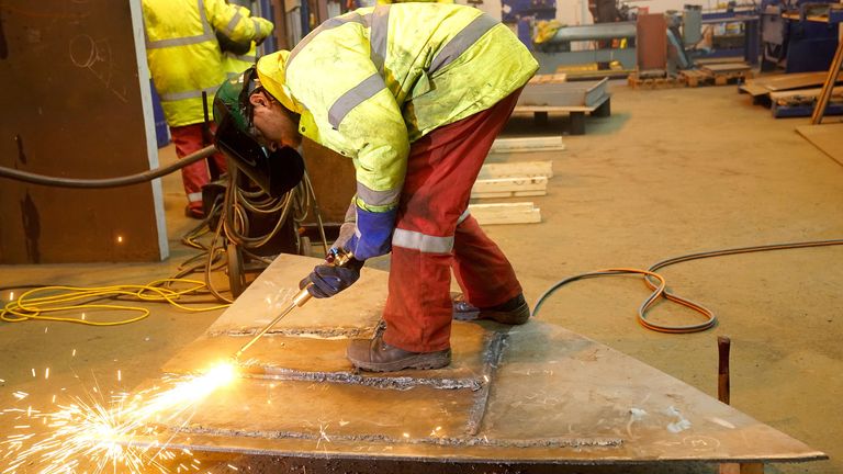 A welder at Harland & Wolff shipyard factory in Belfast
PIc: PA