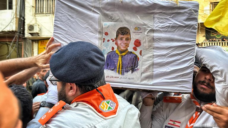 Hezbollah supporters carry coffin of boy killed in Israel pager attacks Pic. Chris Cunningham, Sky producer