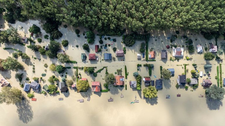 An aerial picture of the village of Venek and the swollen Danube River near Gyor, Hungary. Pic: AP