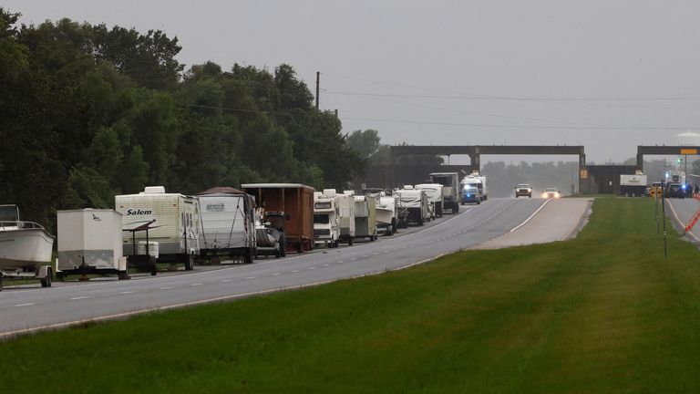 Boats and RVs line the roadside of LA Highway 46 just beyond the levee gate as Hurricane Francine intensified ahead of its expected landfall on the U.S. Gulf Coast in New Orleans, Louisiana, U.S., September 11, 2024. REUTERS/Edmund Fountain