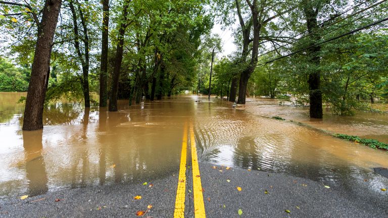 Bohler Road is flooded near Peachtree Creek Friday, Sept 27, 2024, in Atlanta. (AP Photo/Jason Allen)