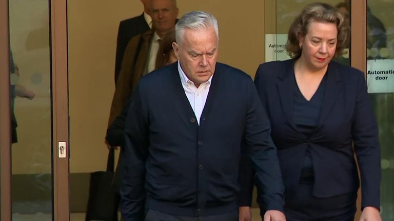 Huw Edwards leaves court after receiving a six-month suspended sentence