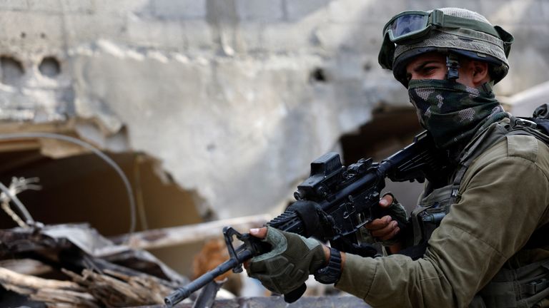 An IDF soldier in the Gaza Strip.
Pic: Reuters