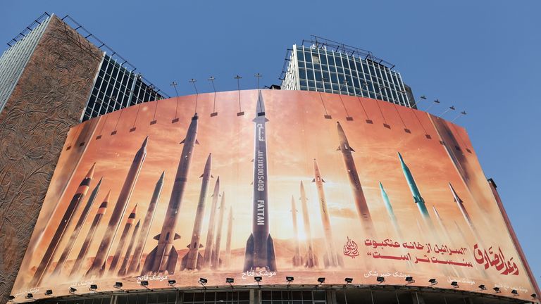 A billboard with a picture of Iranian missiles is seen on a street in Tehran, Iran. Pic: Reuters