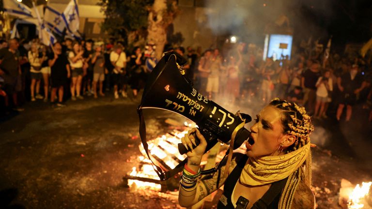 Protesters call for a ceasefire and hostage release deal during huge rally in Tel Aviv