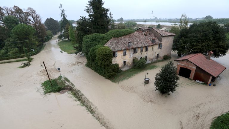 The Lamone river overflows its banks near Bagnacavallo, in the region of Emilia-Romagna, Italy, Thursday, Sept. 19, 2024. (Fabrizio Zani/LaPresse via AP)