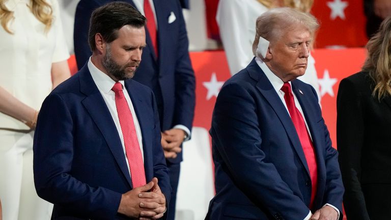 Republican presidential candidate former President Donald Trump and Republican vice presidential candidate Sen. JD Vance, R-Ohio, pray during the Republican National Convention Thursday, July 18, 2024, in Milwaukee. (AP Photo/Charles Rex Arbogast)