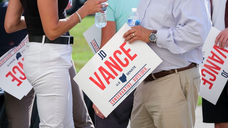 Signs held by Vance's supporters as he announced he was joining Senate race. Pic: AP