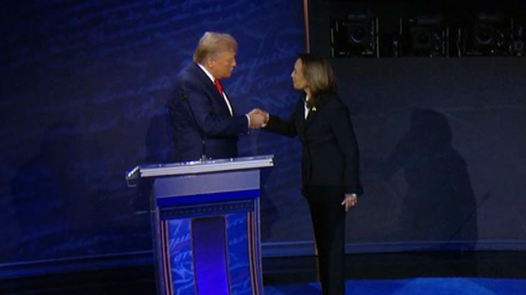 Kamala Harris walks to Donald Trump&#39;s lectern for the handshake before the presidential debate