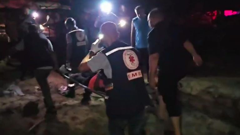 First responders at a tent encampment near Khan Younis in the Al-Mawasi area, a designated humanitarian zone, after an Israeli attack.
Pic: Sky News