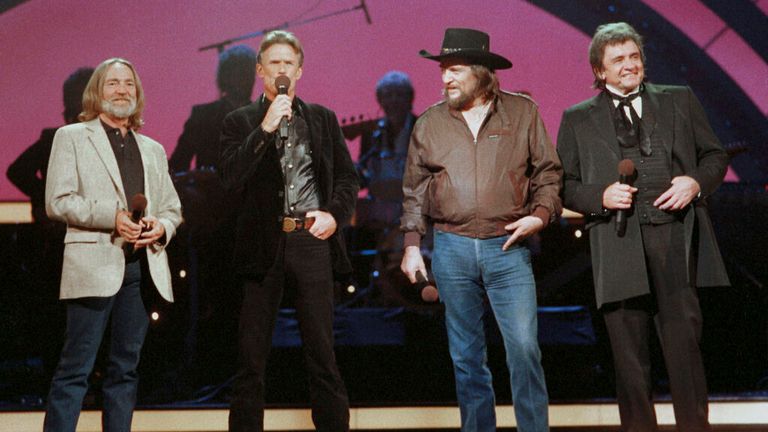 FILE - Members of The Highwaymen, Willie Nelson, Kris Kristofferson, Waylon Jennings and Johnny Cash appear on stage in October 1985. Kristofferson has retired after five decades. A statement from his publicist said the Country Music Hall of Famer and Grammy winner retired in 2020. His son, John, stepped in last year to oversee his father's business including his record label. The Texas-born Oxford scholar brought introspective and poetic lyrics to country music with songs like “Sunday Mornin' C