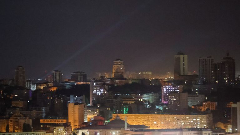 Search lights during a drone attack on Kyiv in the early hours of Saturday. Pic: Reuters