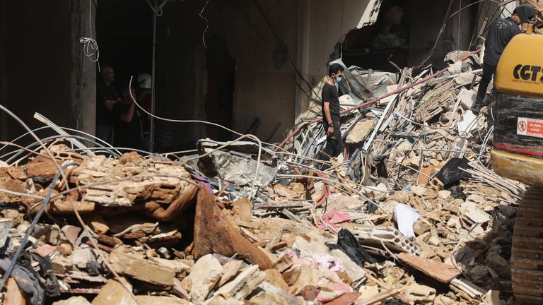 Debris covers the ground near a damaged building at the site of Friday's Israeli strike, as search and rescue operations continue, in Beirut's southern suburbs, Lebanon September 21, 2024. REUTERS/Amr Abdallah Dalsh