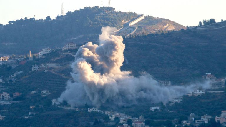 Smoke rises from the southern Lebanese village of Kfar Kila yesterday. Pic: Reuters