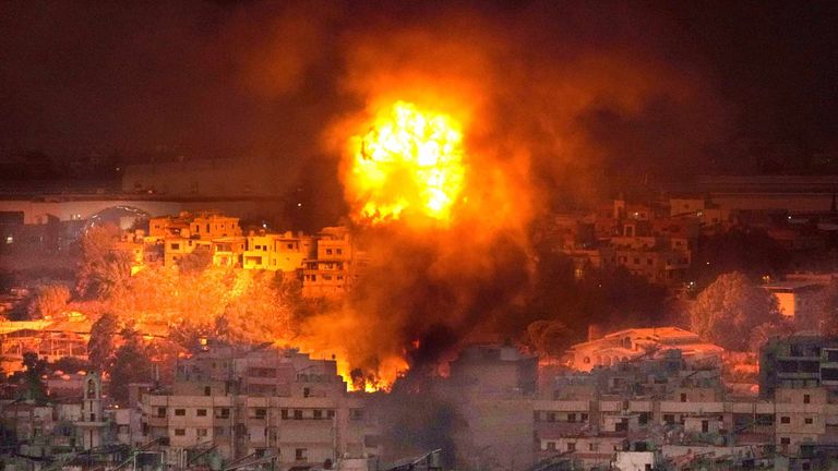 Flames rise after an Israeli airstrike in the southern suburbs of Beirut this morning. Pic: AP