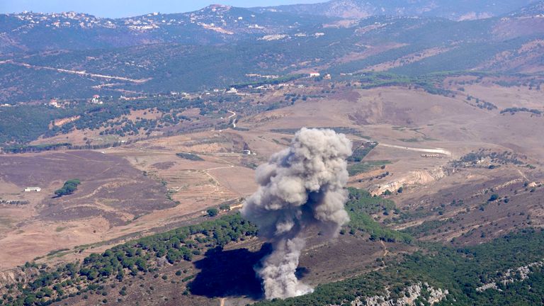 Smoke rises from an Israeli airstrike on the Mahmoudieh mountain, as seen from Marjayoun town, south Lebanon, Tuesday, Sept. 24, 2024. (AP Photo/Hussein Malla)