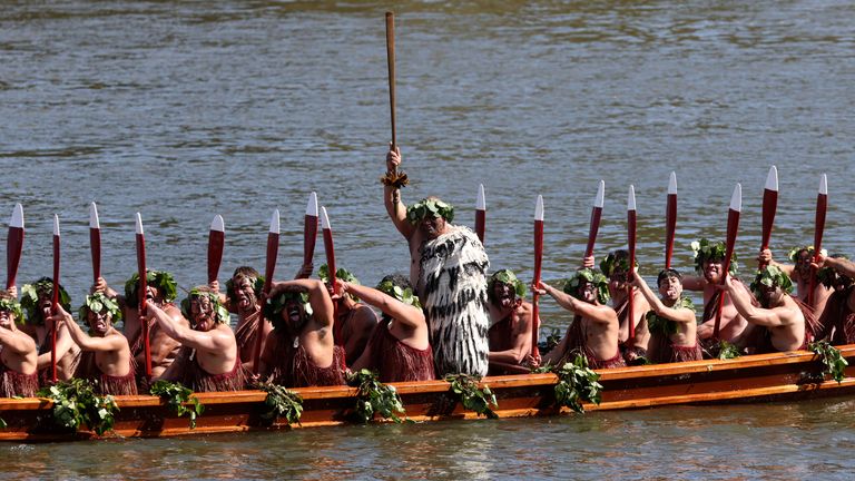 A waka, a traditional canoe, is paddled by warriors as part of the funeral of New Zealand's Maori King, Kiingi Tuheitia Pootatau Te Wherowhero VII. Pic: AP 