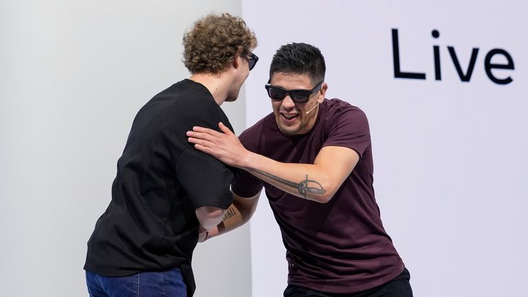 Mark Zuckerberg, left, thanks UFC fighter Brandon Moreno for demonstrating a live translation feature. Pic: AP