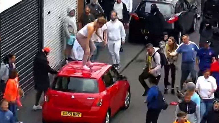 Davison jumping up and down on a car. Pic: Cleveland Police/PA