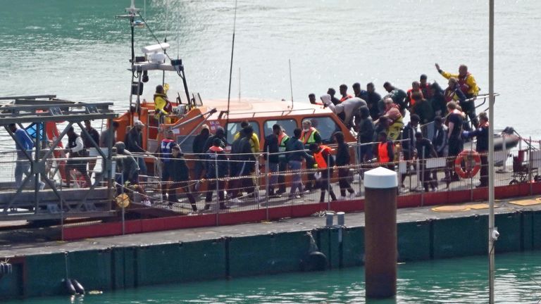 A group of people believed to be migrants are taken to Dover, Kent aboard the RNLI Dungeness Lifeboat following an incident involving a small boat in the English Channel. Date photographed: 3 September 2024.