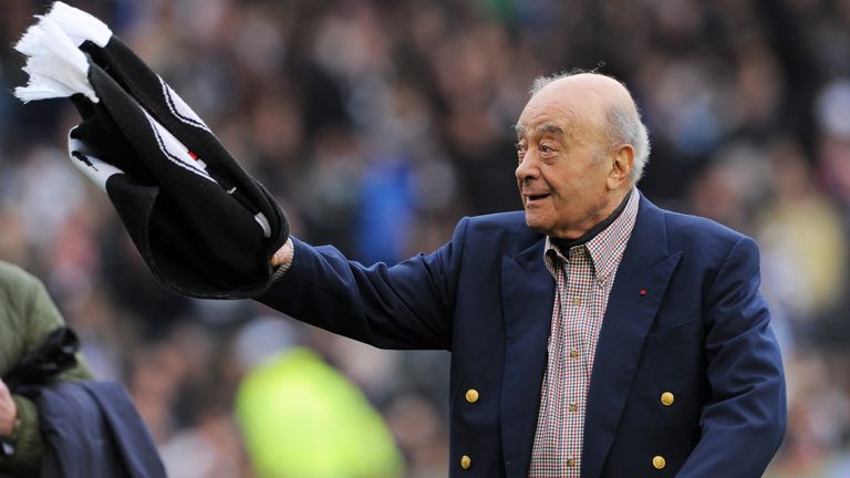 Mohamed al Fayed waves a Fulham scarf for supporters in 2012. Photo: Reuters