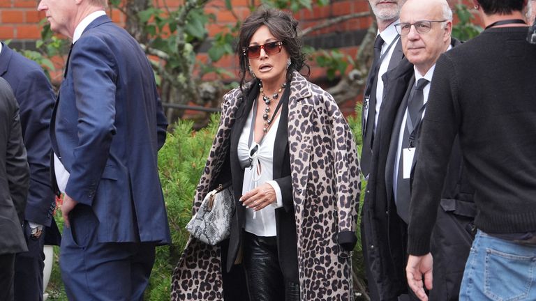 Nancy Dell'Olio arrives for the funeral. Pic: PA