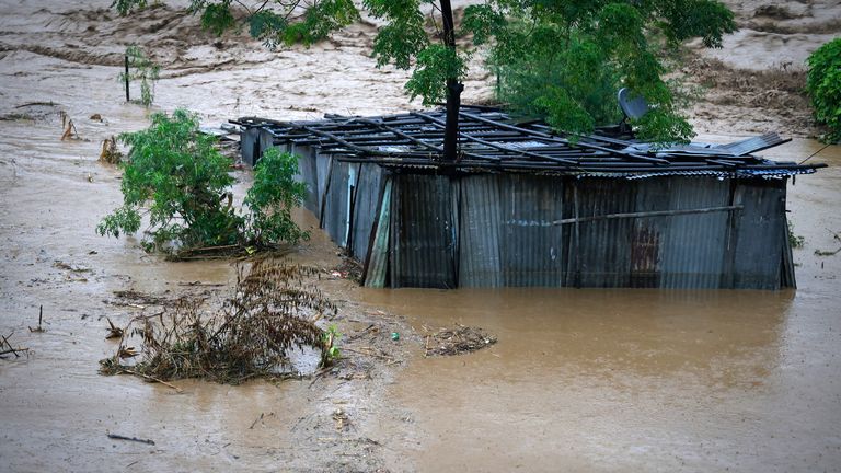 Flooding in Nepal kills at least 129 as swollen rivers pour through ...