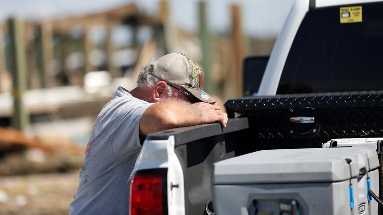 Greg Staab, a Keaton Beach resident, becomes emotional as he retrieves belongings from his property after Hurricane Helene moved through the Florida panhandle and severely impacted the community in Keaton Beach, Florida, U.S., September 29, 2024. REUTERS/Octavio Jones