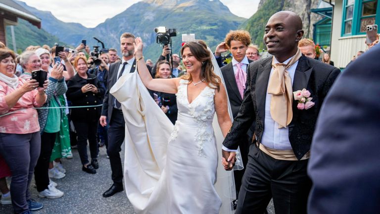 Norway's Princess Martha Louise and Durek Verrett hold hands on the day of their wedding party in Geiranger, Norway August 31, 2024. NTB/Heiko Junge/via REUTERS ATTENTION EDITORS - THIS IMAGE WAS PROVIDED BY A THIRD PARTY. NORWAY OUT. NO COMMERCIAL OR EDITORIAL SALES IN NORWAY.