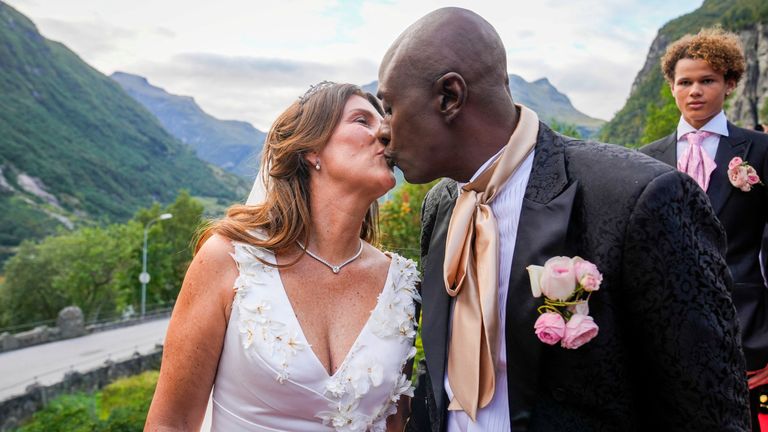 Norway's Princess Martha Louise and Durek Verrett kiss each other on the day of their wedding party in Geiranger, Norway August 31, 2024. NTB/Heiko Junge/via REUTERS ATTENTION EDITORS - THIS IMAGE WAS PROVIDED BY A THIRD PARTY. NORWAY OUT. NO COMMERCIAL OR EDITORIAL SALES IN NORWAY.