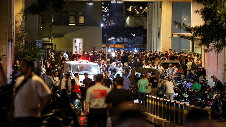 People gather outside American University of Beirut Medical Center (AUBMC) as more than 1,000 people, including Hezbollah fighters and medics, were wounded when the pagers they use to communicate exploded across Lebanon, according to a security source, in Beirut, Lebanon September 17, 2024. REUTERS/Mohamed Azakir TPX IMAGES OF THE DAY