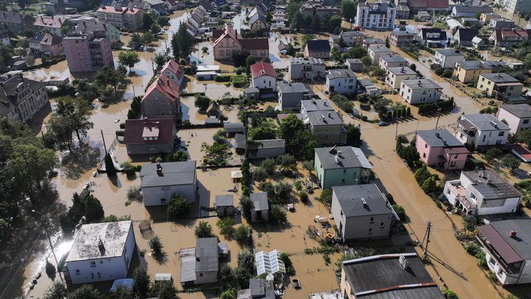 A drone view shows a flooded area by Nysa Klodzka river in Lewin Brzeski, Poland. Pic: Reuters