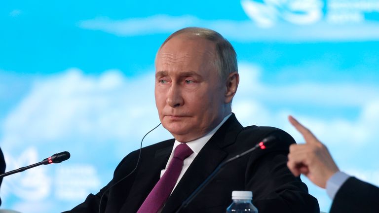 Russian President Vladimir Putin, left, and China's Vice President Han Zheng speak during the plenary session of Eastern Economic Forum in Vladivostok, Russia, Thursday, Sept. 5, 2024. (Vyacheslav Prokofyev, Sputnik, Kremlin Pool Photo via AP)