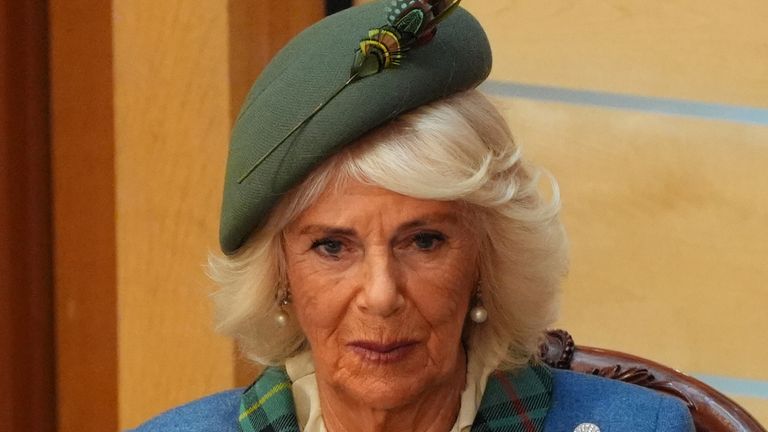 Queen Camilla sits alongside the King as he makes his speech on Saturday. Pic: PA