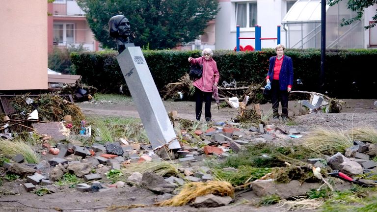 Residents look at the damage following recent floods in Jesenik, Czech Republic.
Pic: AP