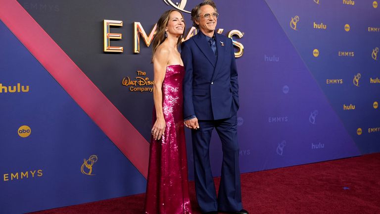 Susan Downey, left, and Robert Downey Jr. arrive at the 76th Primetime Emmy Awards on Sunday, Sept. 15, 2024, at the Peacock Theater in Los Angeles. (AP Photo/Jae C. Hong)