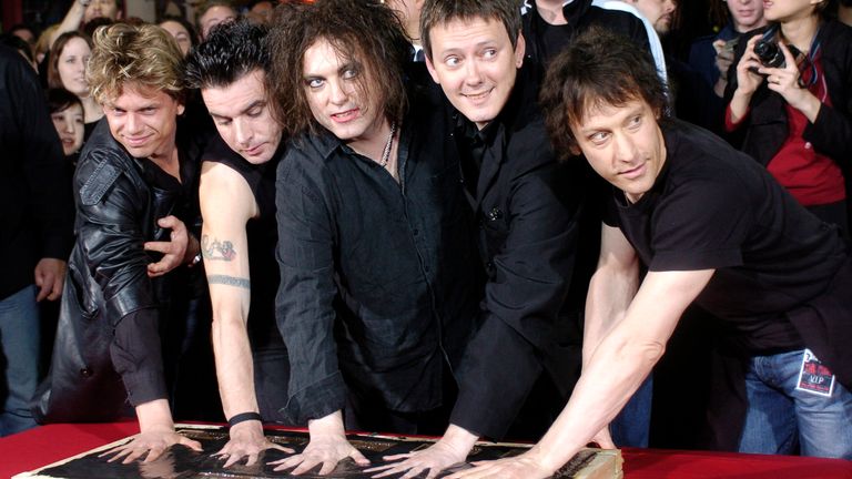 The Cure's Jason Cooper, Simon Gallup, Robert Smith, Roger O'Donnell and Perry Bamonte at Hollywood's Rockwalk in Los Angeles in 2004. Pic: AP