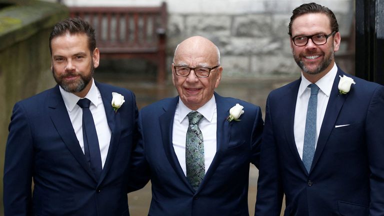  Media Mogul Rupert Murdoch (C) poses for a photograph with his sons Lachlan (L) and James as they arrive at St Bride's church for a service to celebrate the wedding between Murdoch and former supermodel Jerry Hall which took place on Friday, in London, Britain March 5, 2016. REUTERS/Peter Nicholls/File Photo