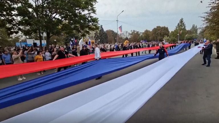 Russia annexation of Ukrainian regions - celebrations in Kherson   pic: AP (grab from video) 