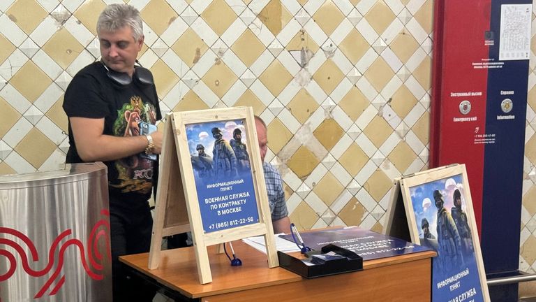 A military enlistment stand at a metro station in Moscow