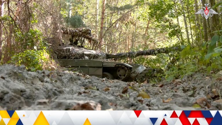 In this photo made from video released by the Russian Defense Ministry on Sunday, Sept. 8, 2024, a Russian tank takes up firing positions at an undisclosed location in the Russian/Ukrainian border area, in the Kursk region, Russia. (Russian Defense Ministry Press Service photo via AP)