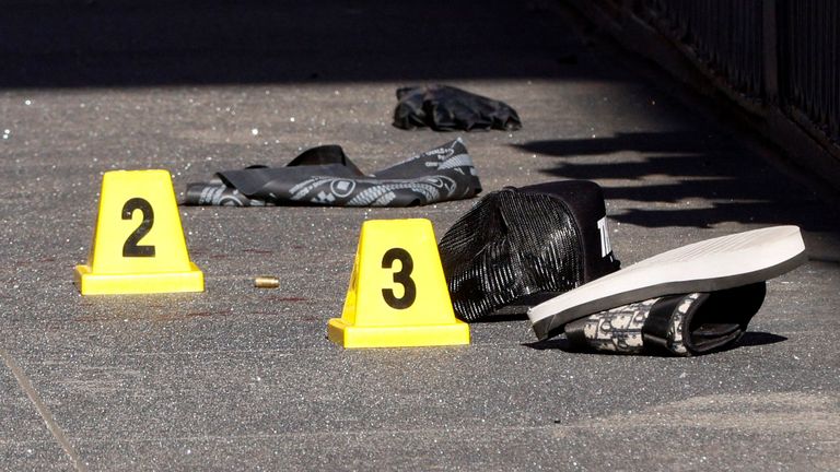 Blood and a shell casing on the scene.Pic: Santiago Mejia/San Francisco Chronicle via AP