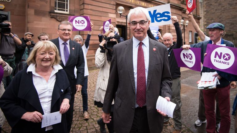 Former chancellor and leader of the Better Together campaign Alistair Darling with his wife Maggie (left) and No campaigners outside the polling station at the Church Hill Theatre in Edinburgh as polls have opened on a historic day for Scotland as voters determine whether the country should remain part of the United Kingdom.